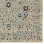 Zoom on corner with detailed scalloped edges and decorative border