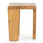 Side profile showing the thick rectangular top and tapered legs in teak wood