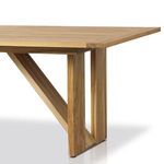 Side angle showing length of table and diagonal trestle support from corner perspective