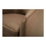 Close-up on softly textured upholstery fabric and seam details on armrest and seat