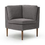 Front view of corner banquette showing symmetrical back cushions and elegant tapered oak legs