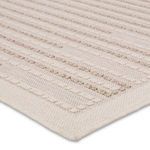 Detailed corner close-up showing fine weave and tightly finished edge binding