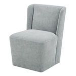 Cormac chair angled to show curved backrest and cushion depth in light gray fabric