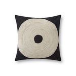 Square pillow with black background and a large concentric circular natural-colored embroidery in the center