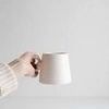 Jerry Double Wrap Handle Mug held sideways showing scale and grip of the double wrap handle