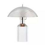 Large table lamp with a dome-shaped polished metal shade and clear cylindrical glass base