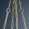 Close-up view of top mount and chain suspension highlighting various paperclip and ring links
