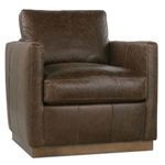 Three-quarter angle highlighting the chair’s armrest and leather texture on the seat and back.