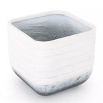 Top-angle view inside the grey ombre square planter showing textured interior