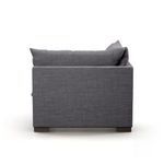 Straight back profile view showing low square back silhouette with charcoal upholstery