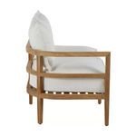 Side profile showing left arm teak frame and thick white cushions with open slat teak base