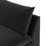 Close-up showing smooth sofa seat cushion surface and fabric texture