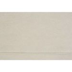 Close-up detail of light beige leather upholstery surface on ottoman