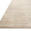 Angled close-up of Arden rug edge showing yarn texture and ribbing on a light background
