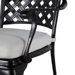 Close view of lattice pattern with central medallion and armrest details