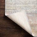 Lucia Mist Rug with folded corner showing the woven backing fabric contrasting with the soft colored pile