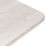 Close-up of the Orlando Dining Table corner showing rounded tabletop edges and fine wood texture
