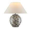 Minnows Blue Table Lamp illuminated, showing the warm light under the white fabric shade