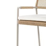 Close-up focused on front corner showing rope wrapping on seat frame and armrest