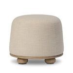 Bilbury Ottoman side view highlighting rounded base and three visible oak bun feet