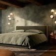 Pair of illuminated Armstrong 4 R Sconces flanking a bed in bedroom with textured walls and wooden beams
