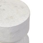 Close-up detail of Ara End Table's rounded top edge and surface texture