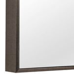 Close-up of Owen Mirror’s dark brown textured frame corner showing material detail