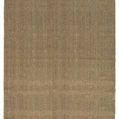 Rectangular seagrass rug shown with slight color variation and different texture visibility under softer lighting