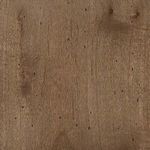 Close-up view of wood finish on the ottoman’s base displaying warm, natural wood grain