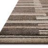Close-up angled view of Silas rug edge showing pile texture and layered geometric design