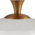 Close detail on the junction of the antique brass neck and white polished glass orb base
