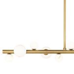 Side view focus on alabaster orbs and metal bar, showing orb size variation and brass finish texture