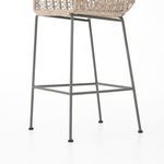 Detailed weave of weather-resistant white wicker emphasizing texture and pattern