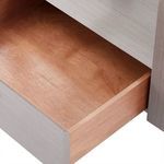 Open drawer interior showing natural wood finish contrasting with taupe gray exterior