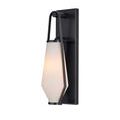 Left angled view of sconce lit, highlighting bronze finish and glowing frosted glass shade
