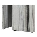 Detail of the table's marble legs showing vertical striped pattern and polished finish