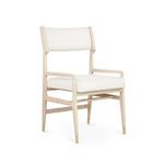 Renata Arm Chair with bleached cerused oak wood frame, sand fabric upholstery, and brass-tipped legs.
