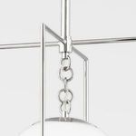 Top view focusing on chain links connecting globe to polished metal rod