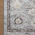 Detailed corner view highlighting Monroe rug’s patterned border and texture on wooden floor