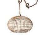Pendant light shown from side angle with braided cord arranged in loops above shade