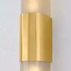 Close-up of the polished gold metal center band on Somersville Wall Sconce with etched glass behind