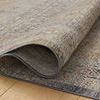 Rolled edge highlighting tightly woven, low-pile texture and color blend of the rug
