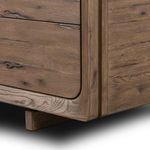 Close-up of partially open drawers highlighting stepped drawer edges and internal oak finish