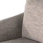 Close-up of back cushion showing corner piping and upholstery texture