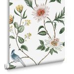 Nuit Wallpaper rolled with visible floral and bird pattern, showing the wallpaper edge and backing