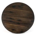 Front view of Powell Dining Table with round oak top and tulip-shaped cast-iron base