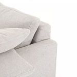 Close-up of armrest cushions focusing on fabric texture and layering arrangement