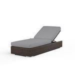Montecito Adjustable Chaise in cognac multi-colored resin wicker with gray cushioned seating and adjustable backrest