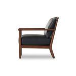Side profile showing seat thickness and gently reclined backrest of chair