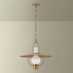 Cahill Lantern pendant showing illuminated white globe variation against beige background